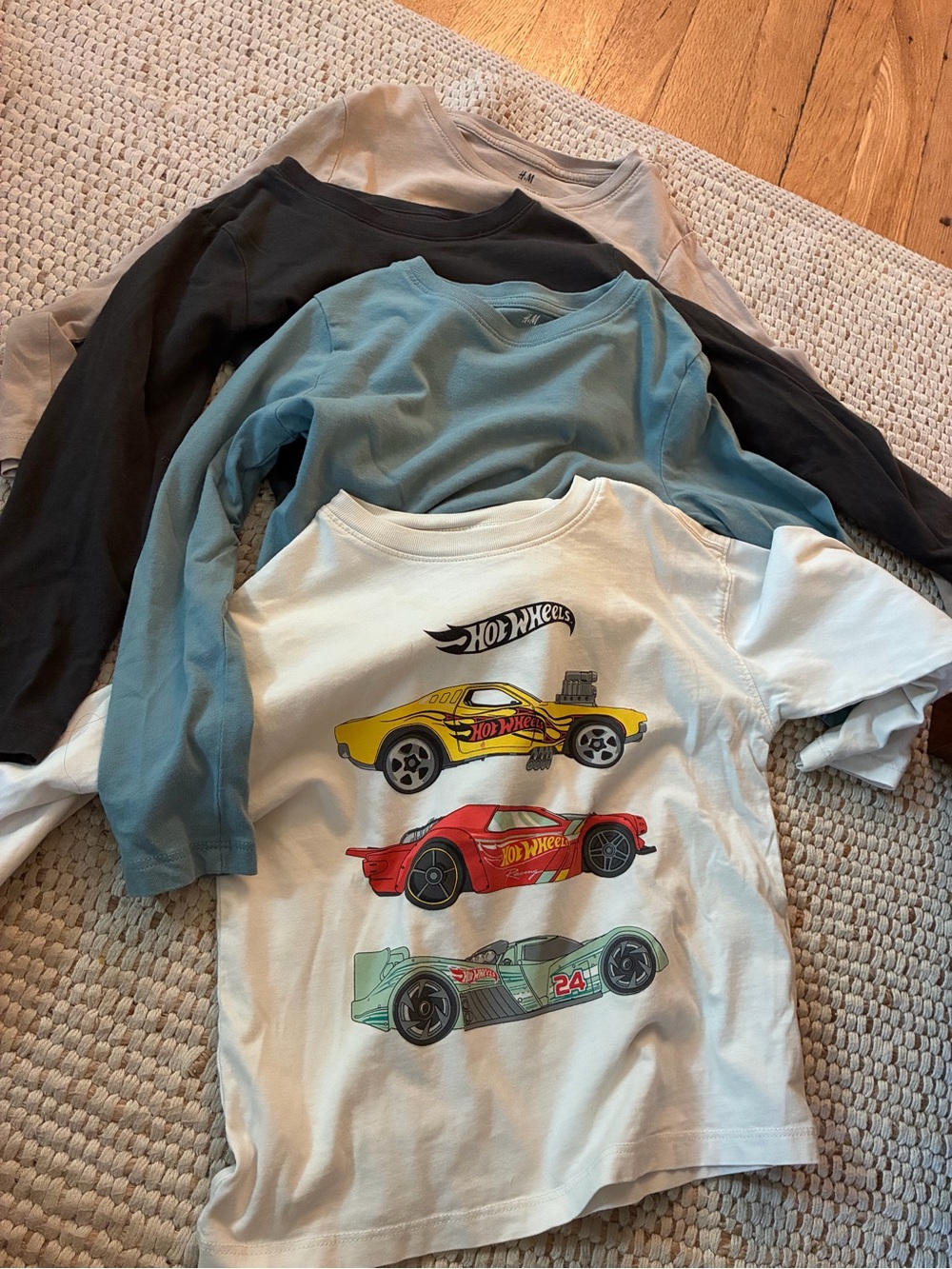 Lot of four H&M long-sleeve boys shirts.
